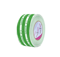 A roll of Gerband 586 green sealing tape with branding visible on the tape.